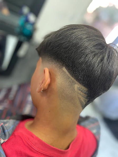 Barbería Meloumari hombre en barbería